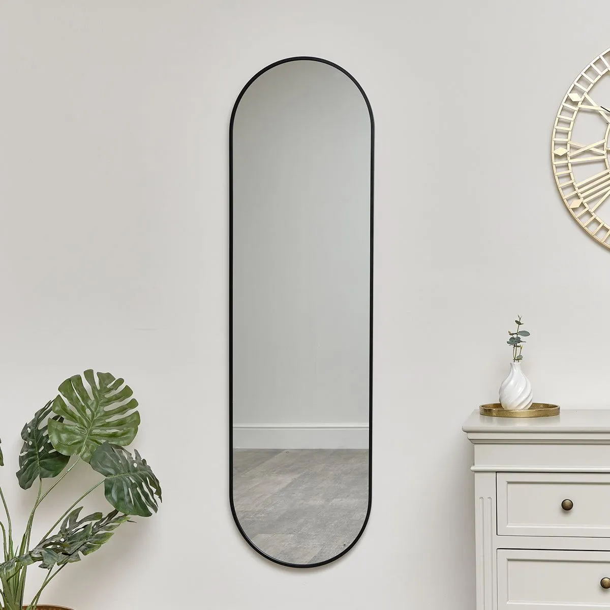 Melody Maison Black Oval Framed Wall Mirror 140cm X 40cm