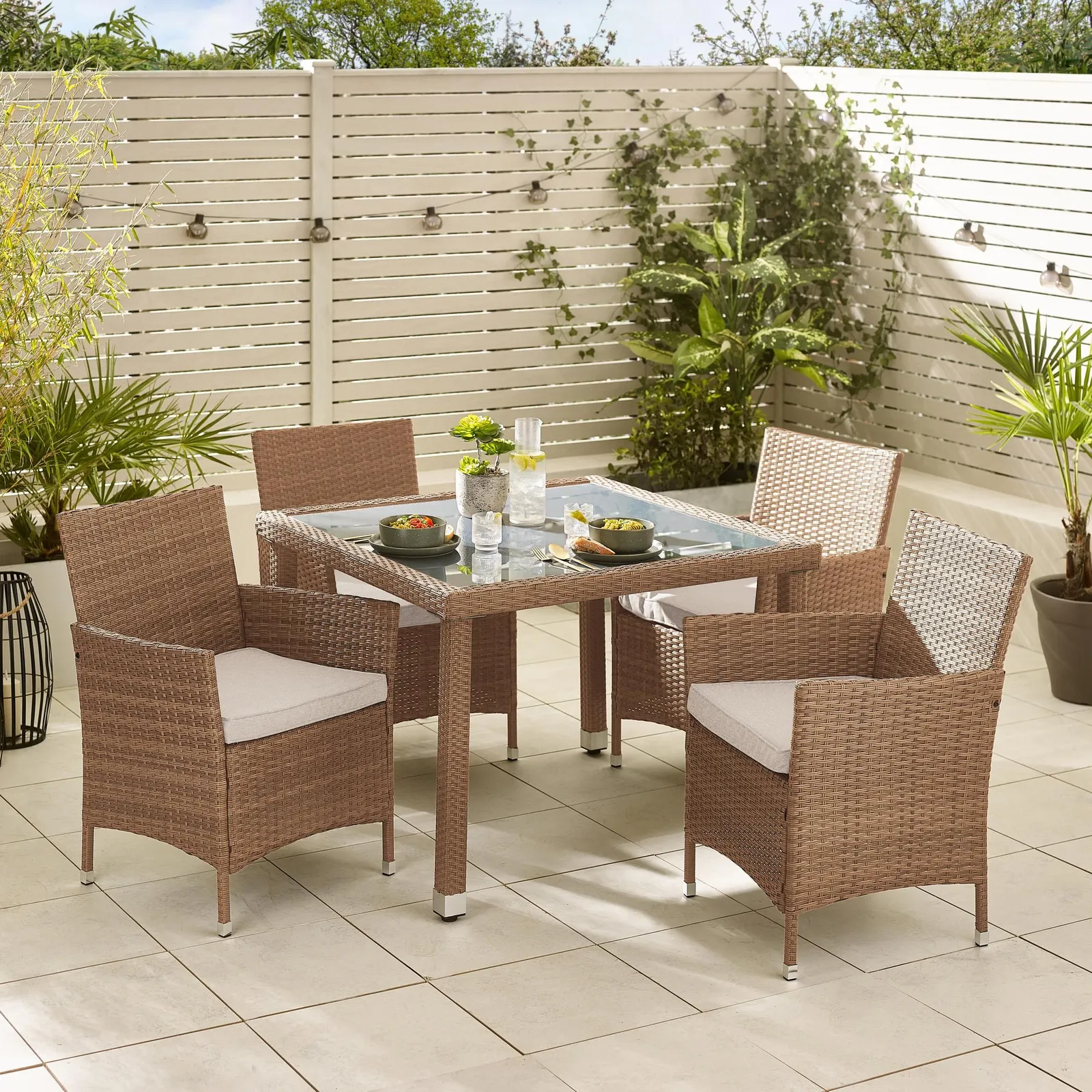 FurnitureboxUK Barbados Rattan Outdoor Garden Dining Set, PE Rattan & Cushions, 4 Chairs 1 Square Glass Top Outdoor Table in Light Brown