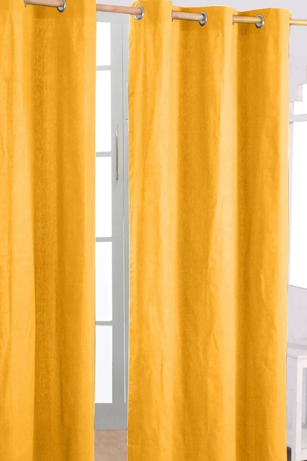 Homescapes Plain Cotton Ready Made Eyelet Curtain Pair in Mustard