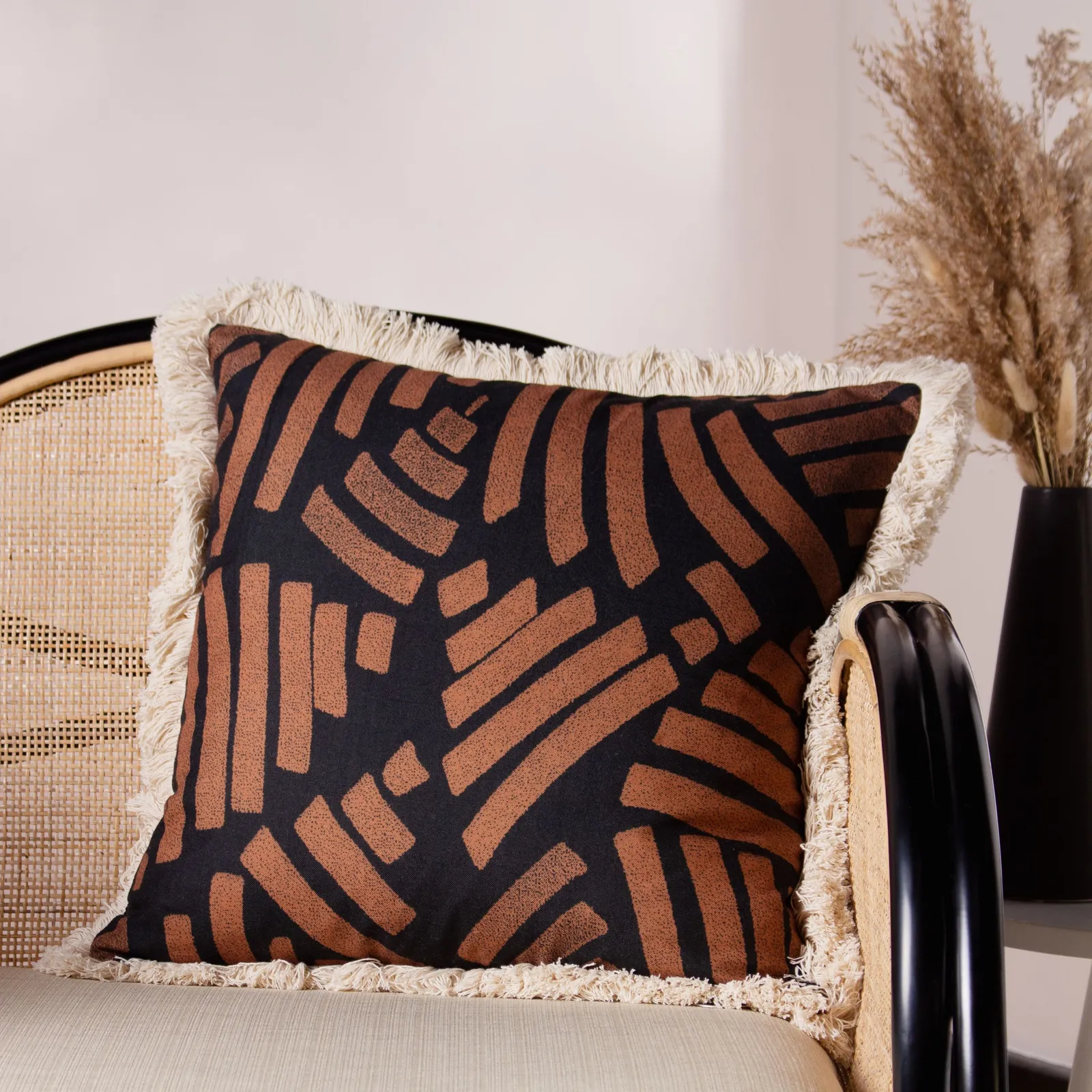 Paoletti Oromo Printed Geometric Fringed Cushion in Brown