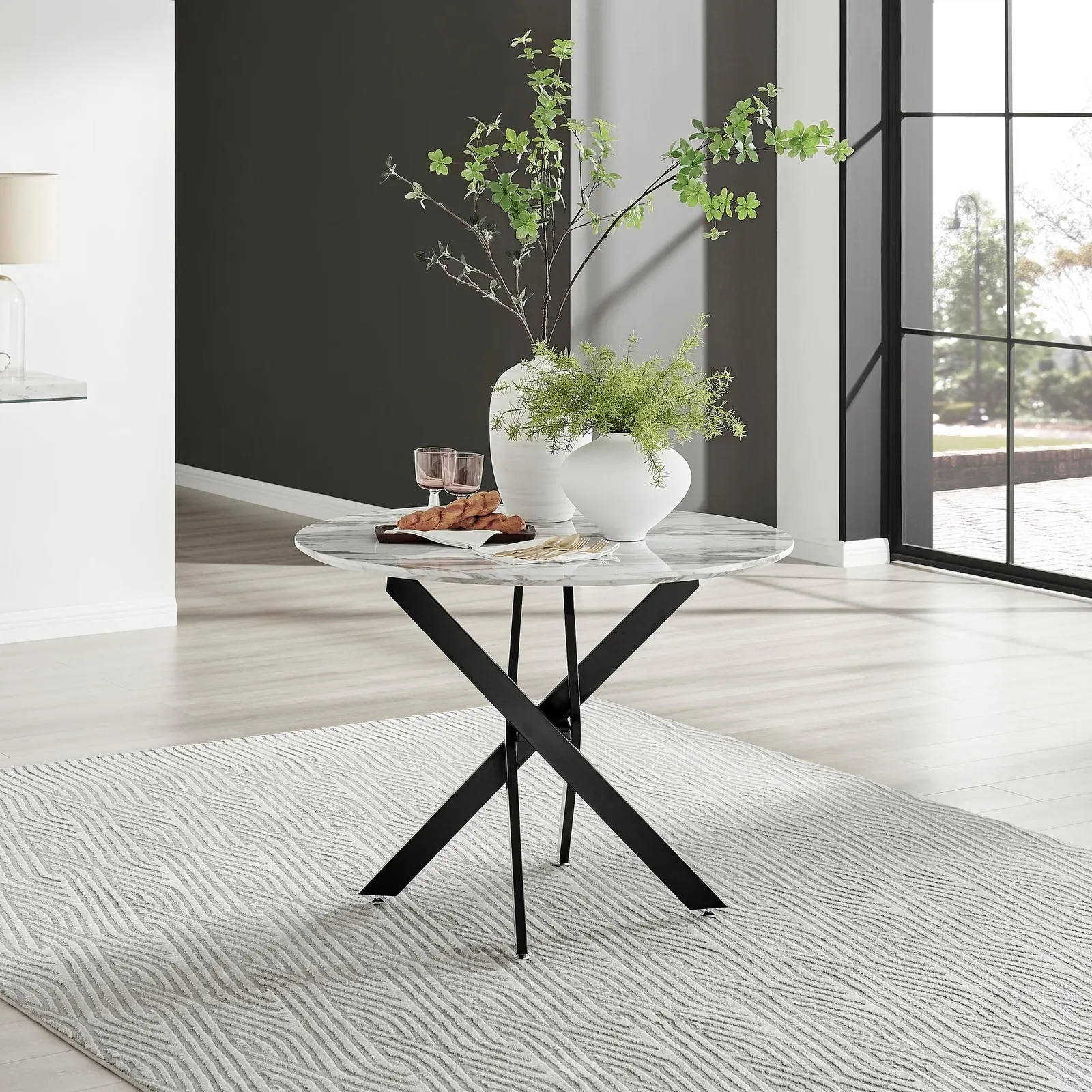 FurnitureboxUK Novara 100cm Round 4-Seater Dining Table With Black Metal Legs in Off-White 1