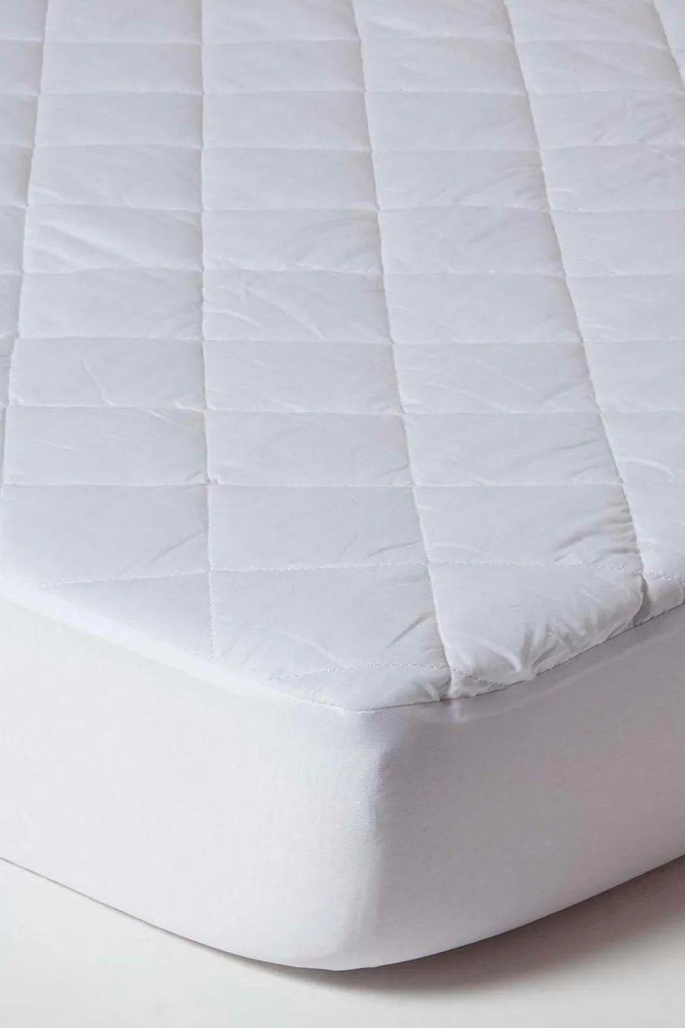 Homescapes Cot Bed Quilted Waterproof Mattress Protector Pack of 2 in White