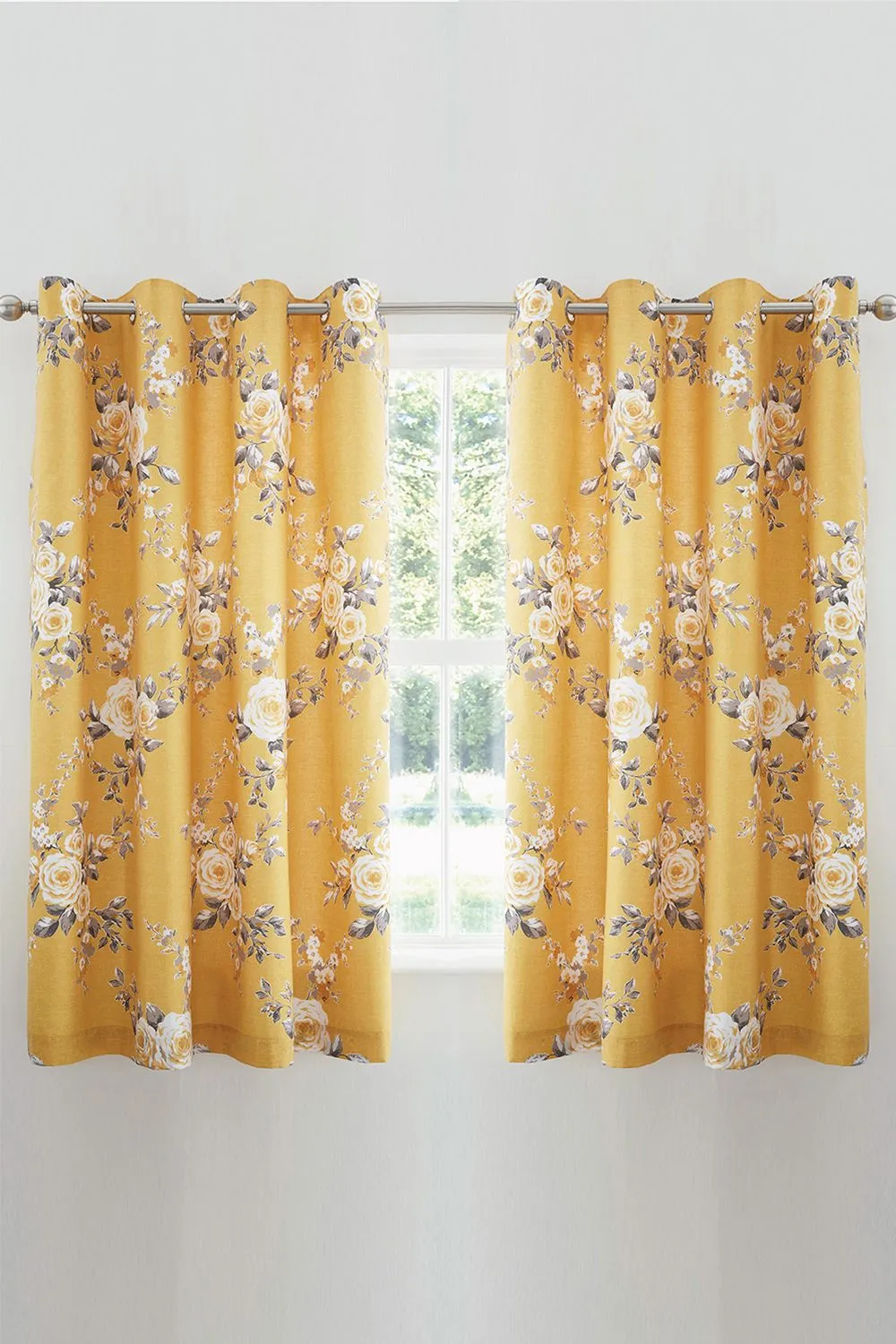 Catherine Lansfield 'Canterbury Floral' Lined Eyelet Curtains in Mustard
