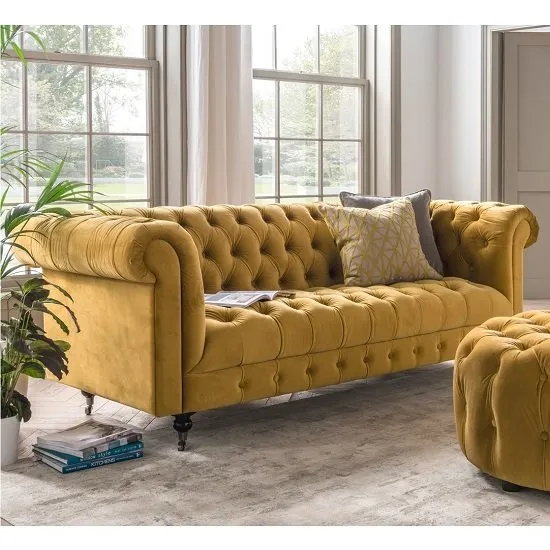 Reedy Chesterfield Three Seater Sofa In Mustard And Metal Castor