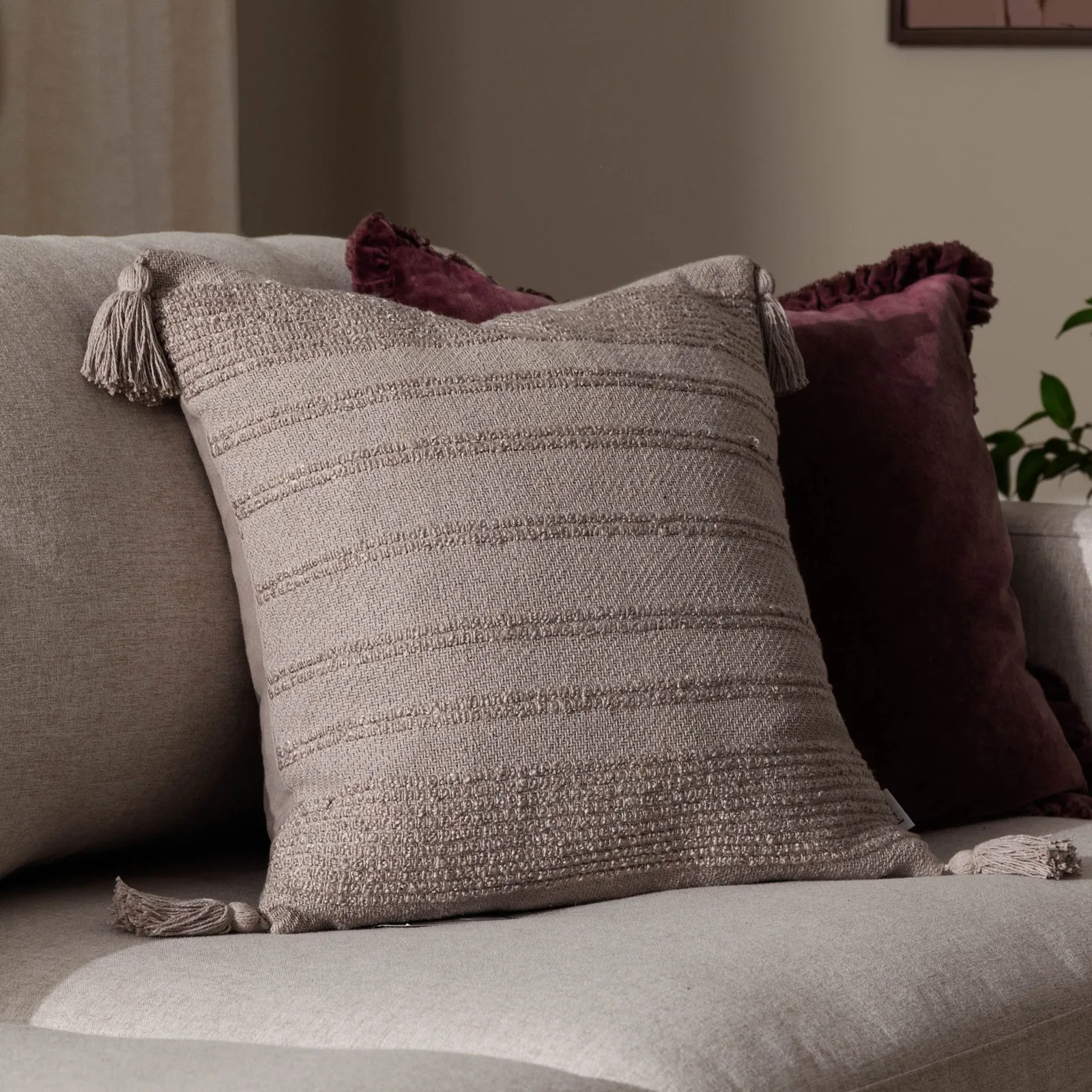 Yard Larch Woven Tasselled Cushion in Cream 1