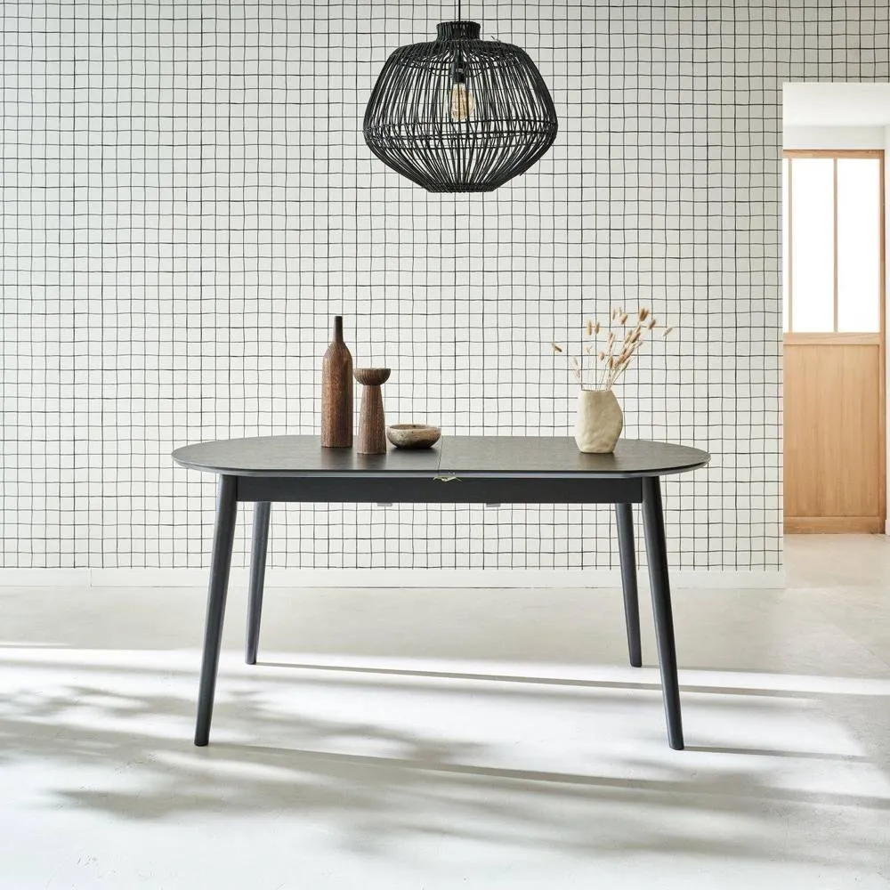 sweeek 6 to 8-seater extendable oval dining table in Black