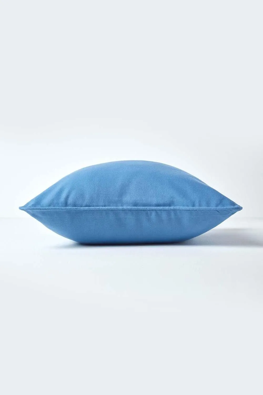 Homescapes Cotton Plain Cushion Cover in Bright Blue 2