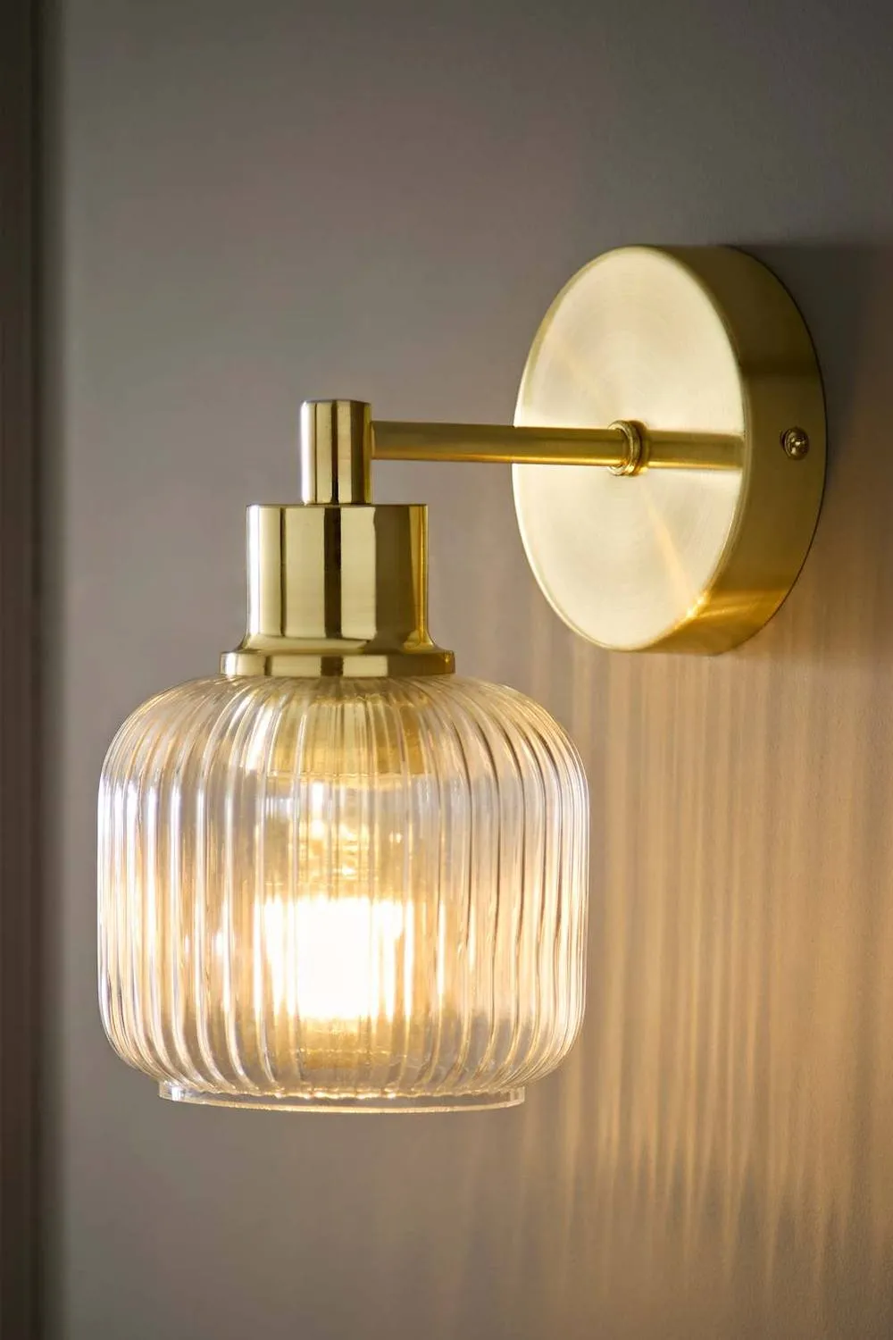 ValueLights Calpe Ribbed Glass Semi Flush Metallic Arm Wall Light in Gold
