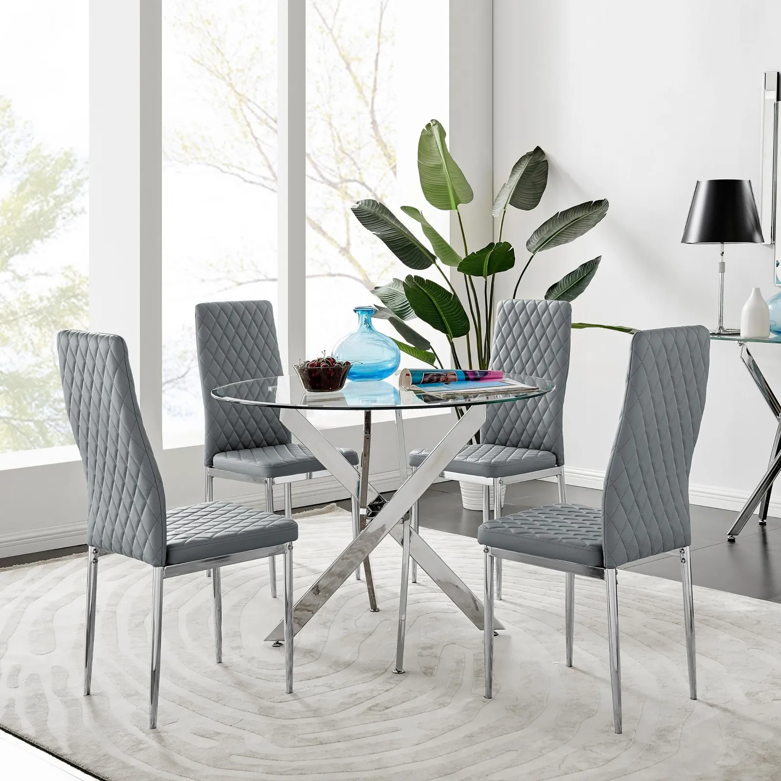 FurnitureboxUK Novara Clear Tempered Glass 100cm Round Dining Table with Chrome Starburst Legs & 4 Milan Faux Leather Chairs in Grey 1