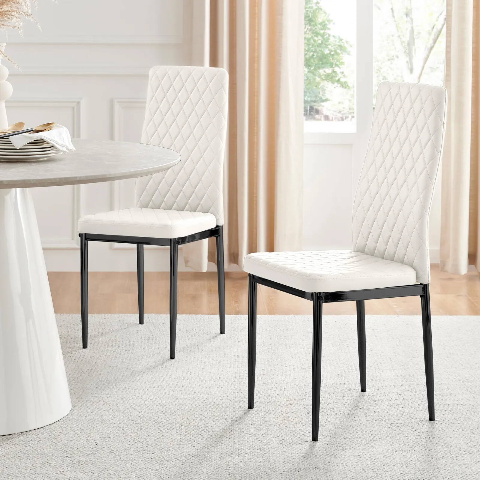 FurnitureboxUK Set of 4 Milan High Back Soft Touch Diamond Pattern Faux Leather Dining Chairs With Black Powder Coated Metal Legs in White