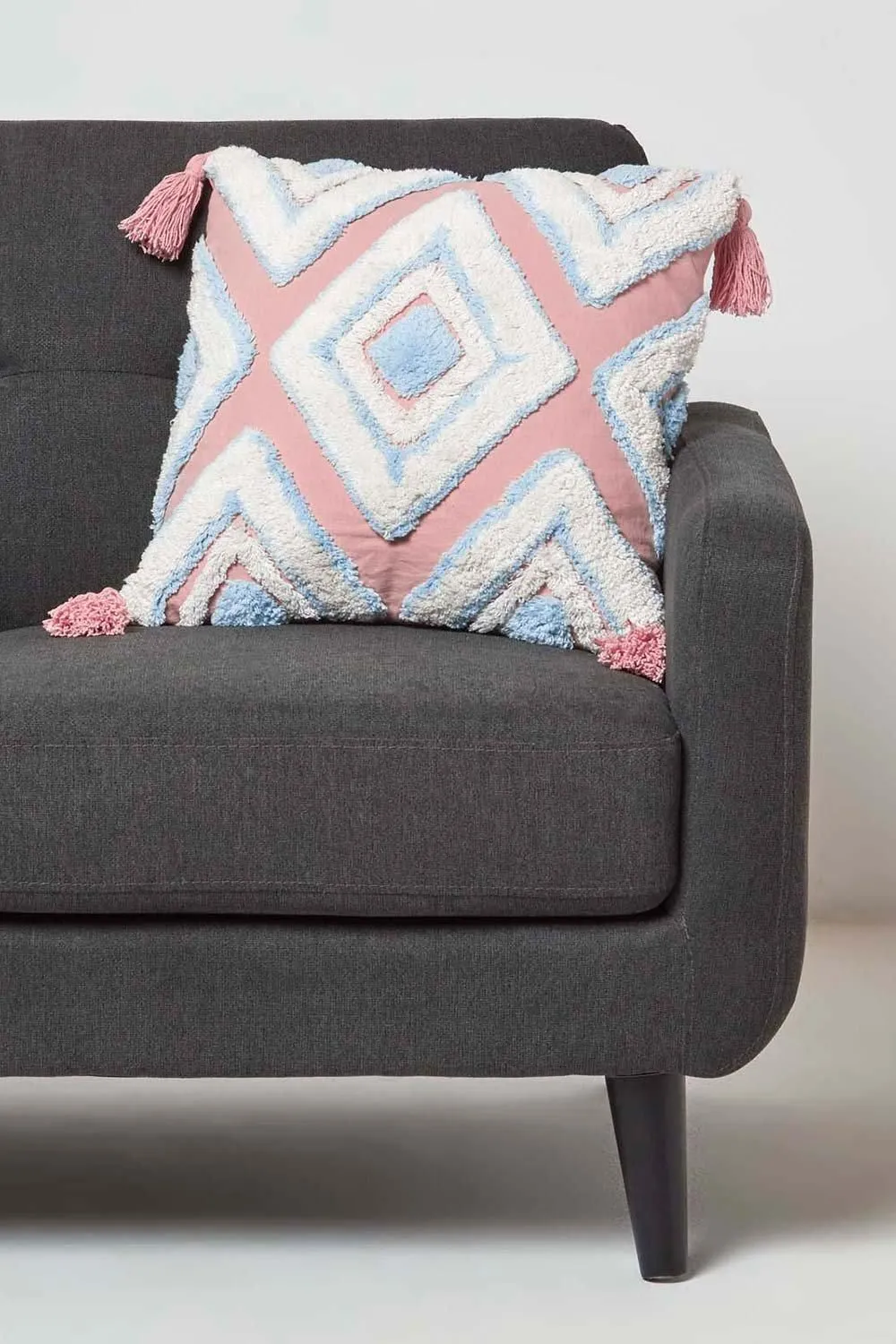 Homescapes Geometric Ikat Tufted Cotton Cushion with Tassels in Blue 2
