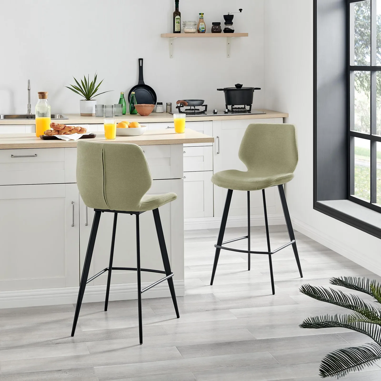 FurnitureboxUK Nyla Set of 2 Fabric Black Leg Counter Stools in Light Green