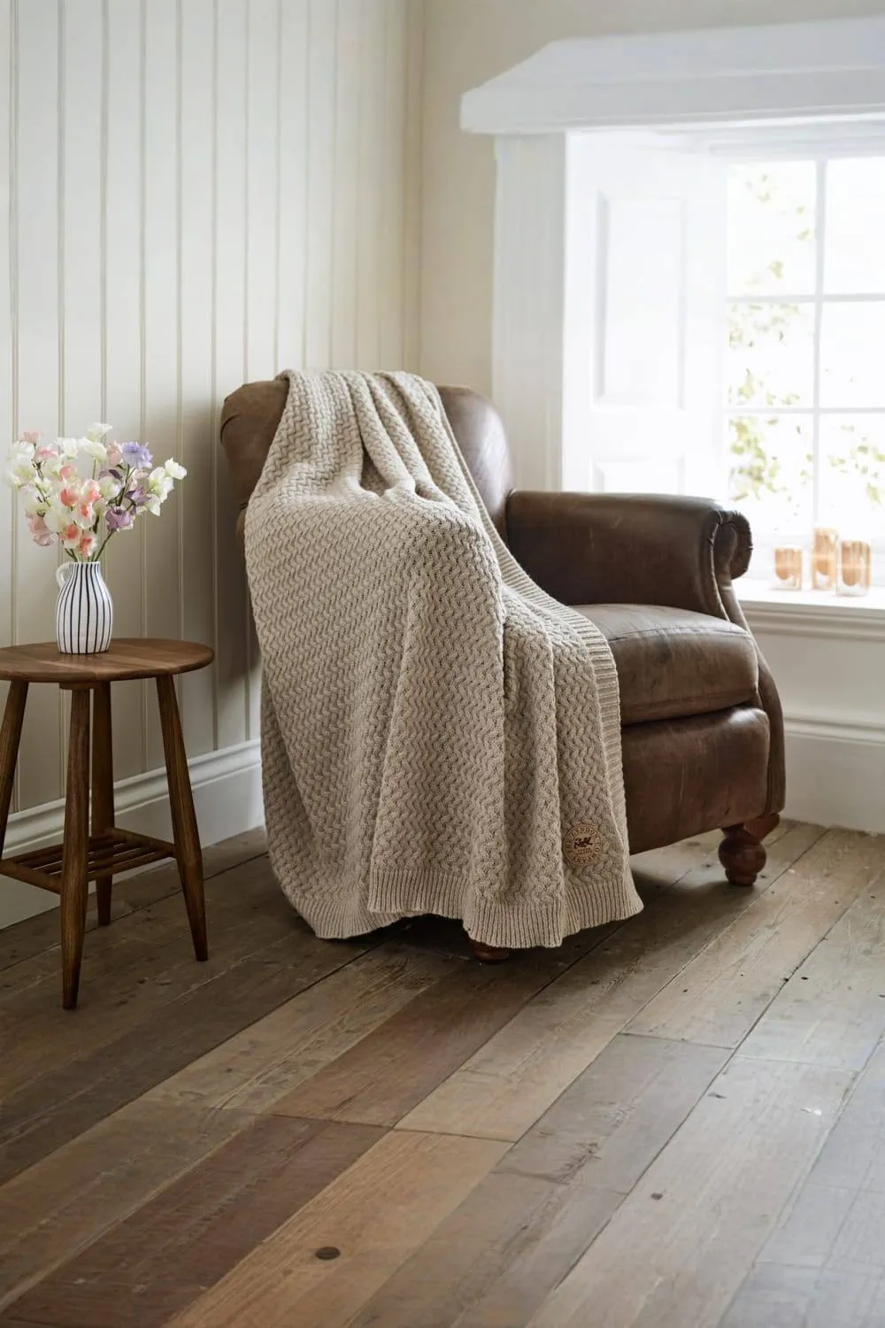 The Lyndon Company Cadenza Knitted Supersoft Yarn Dyed Knit Throw in Cream