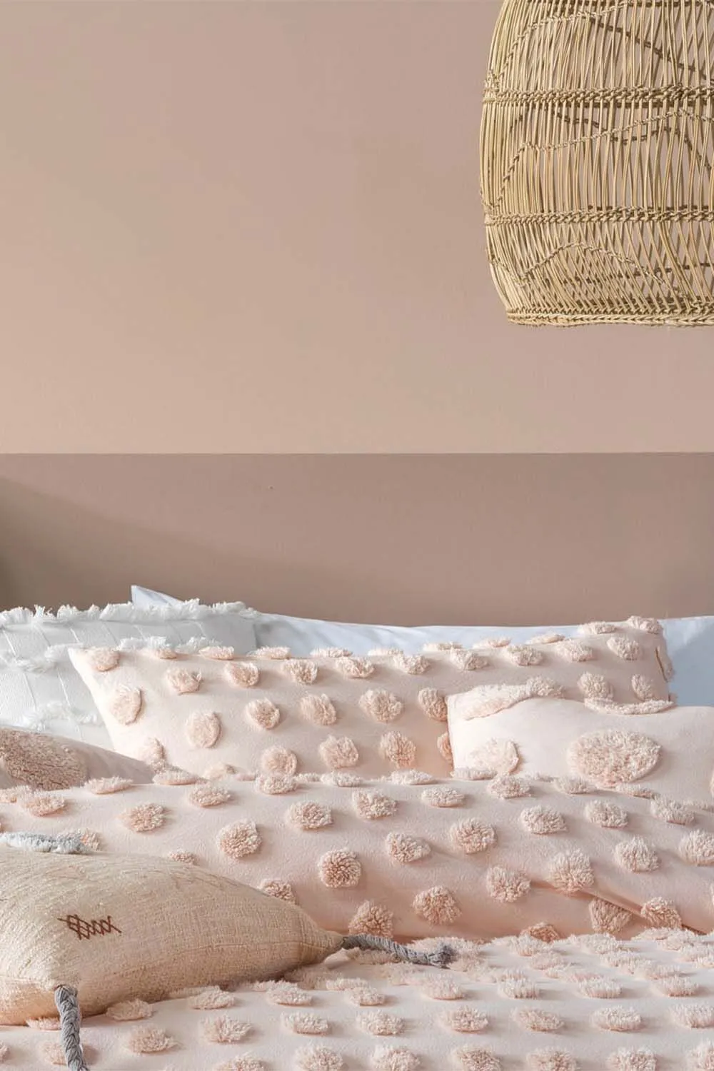 Linen House Haze Tufted Polka Dot Pillowcase Set in Peach