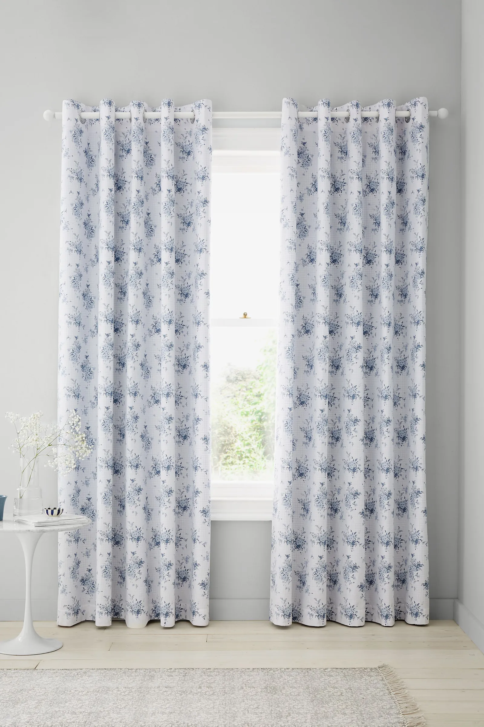 Catherine Lansfield 'Lucie Floral Frill' Fully Reversible Eyelet Curtains in Blue