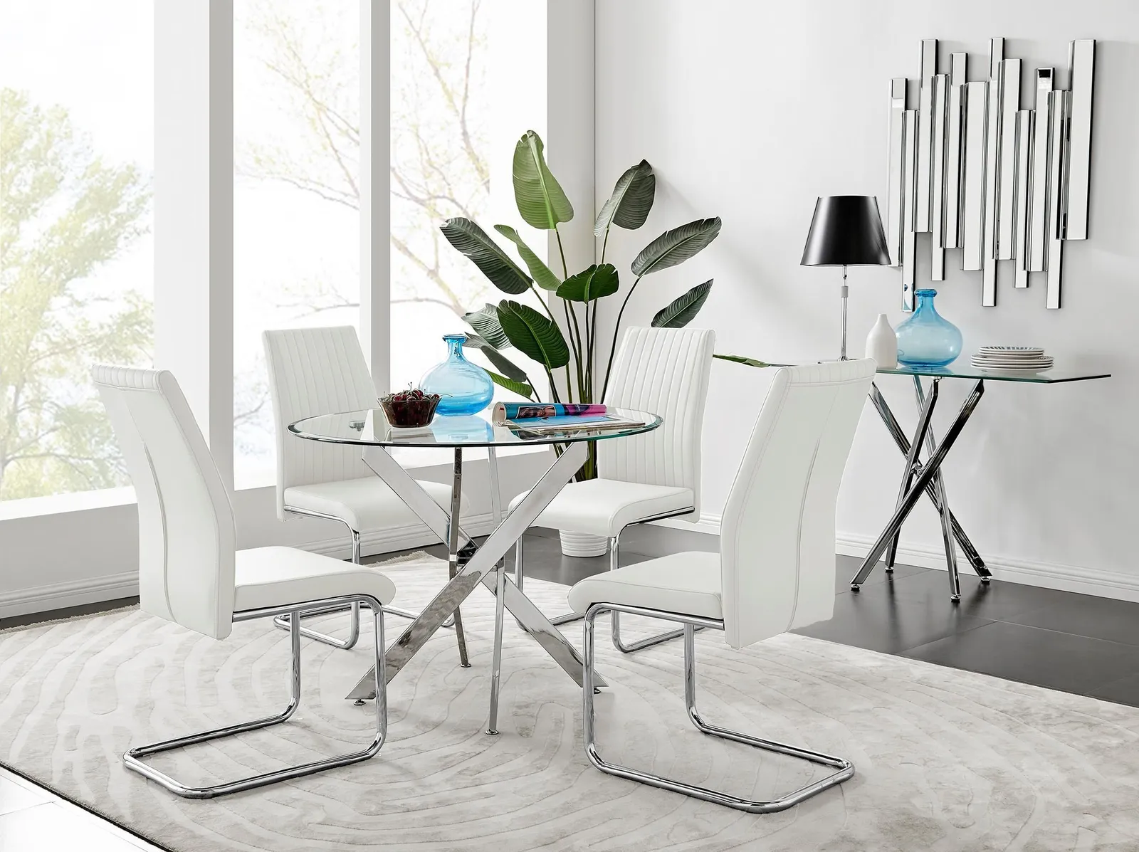 FurnitureboxUK Novara Clear Tempered Glass 100cm Round Dining Table with Chrome Starburst Legs & 4 Lorenzo Faux Leather Chairs in White 1