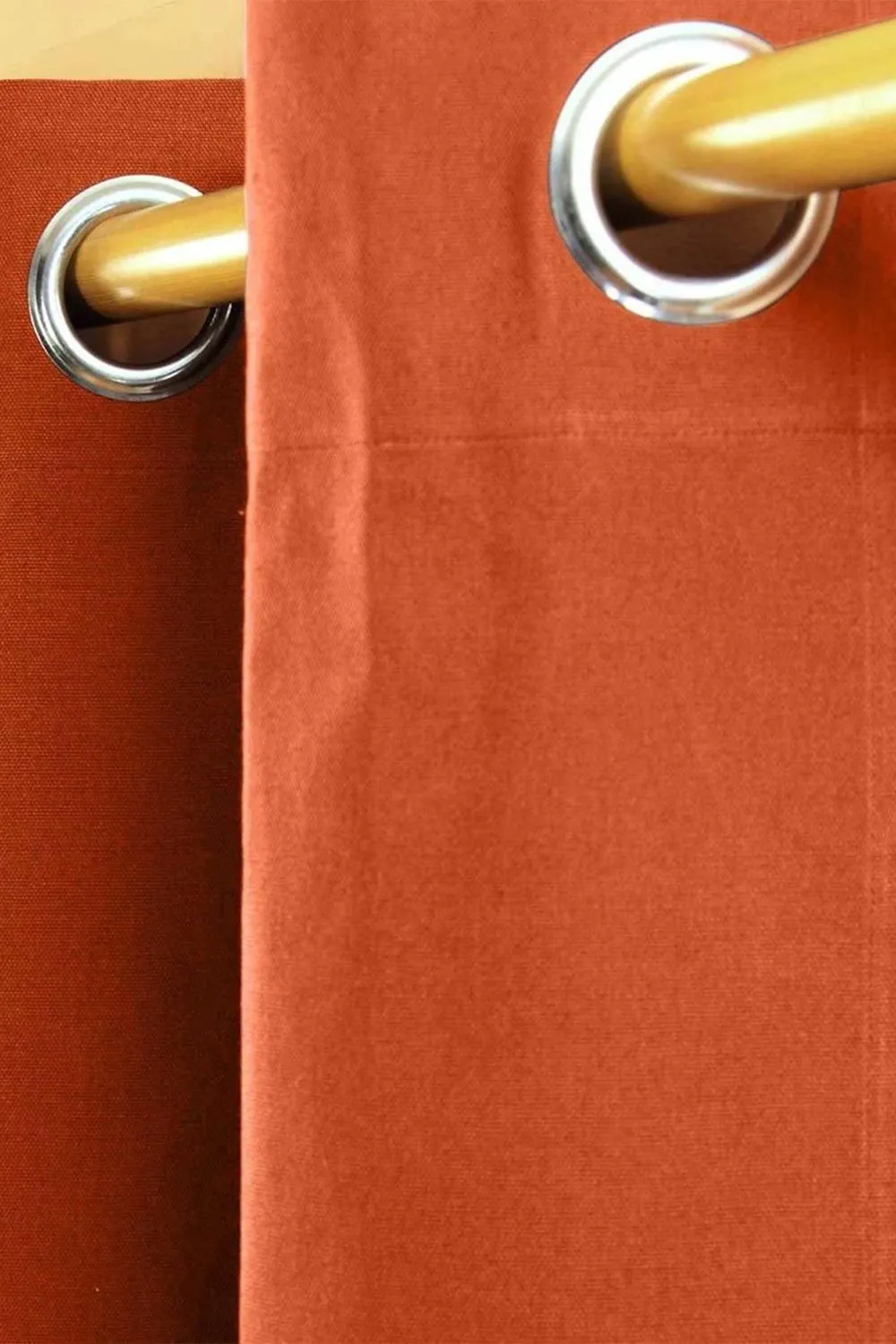 Homescapes Plain Cotton Ready Made Eyelet Curtain Pair in Burnt Orange 2