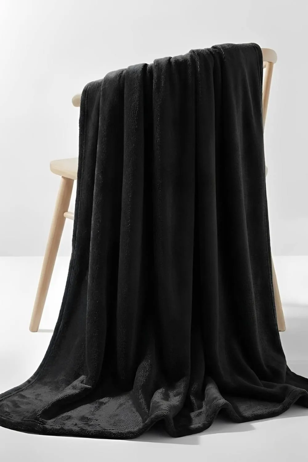 Pamposh Flannel Fleece Blanket Reversible Throw in Black