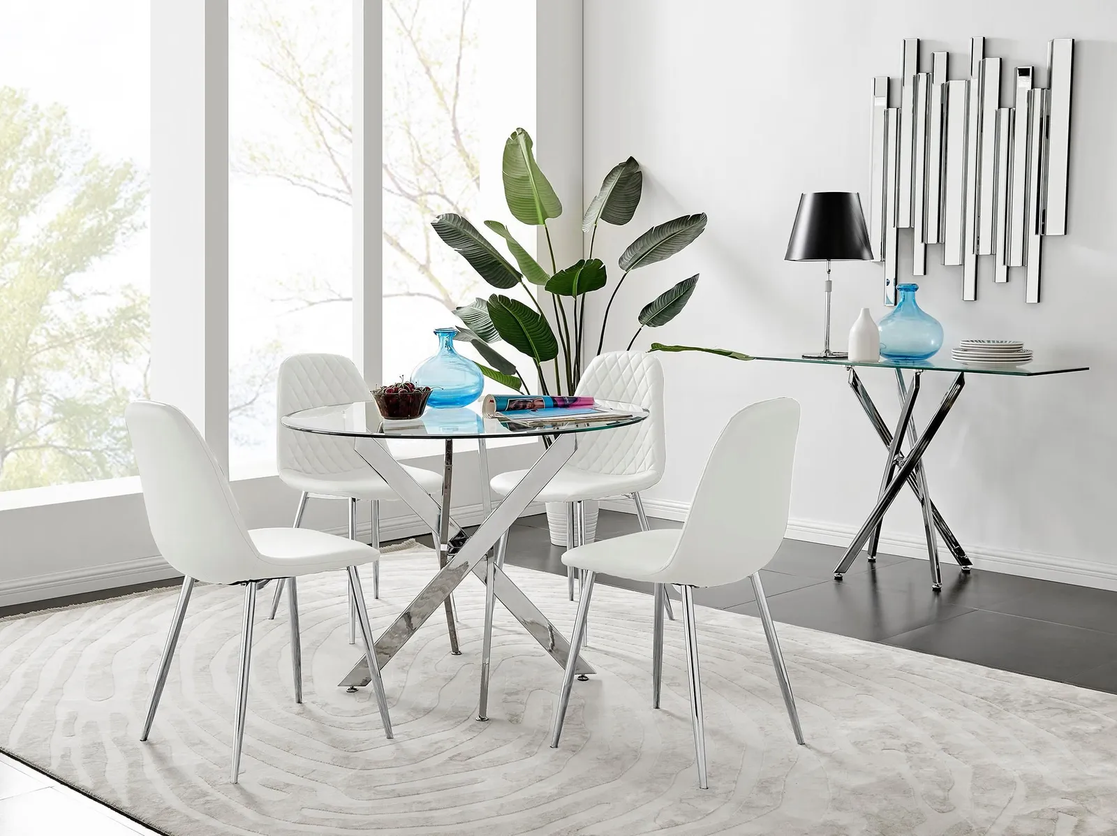 FurnitureboxUK Novara Clear Tempered Glass 100cm Round Dining Table with Chrome Starburst Legs & 4 Corona Faux Leather Silver Leg Chairs in White 1