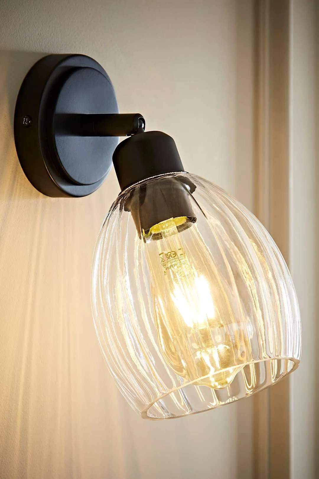 ValueLights Cheltenham Ribbed Glass Dome Adjustable Spotlight Wall Light in Black 1