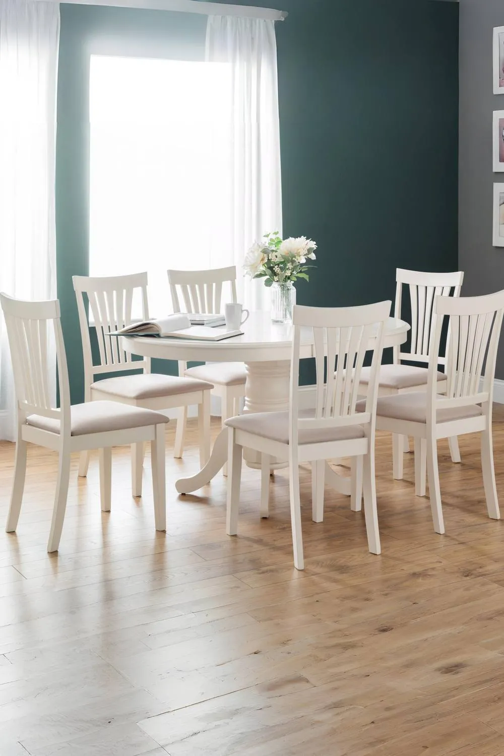 Julian Bowen Stanmore Round to Oval Extending 4-6 Seater Dining Table in Ivory