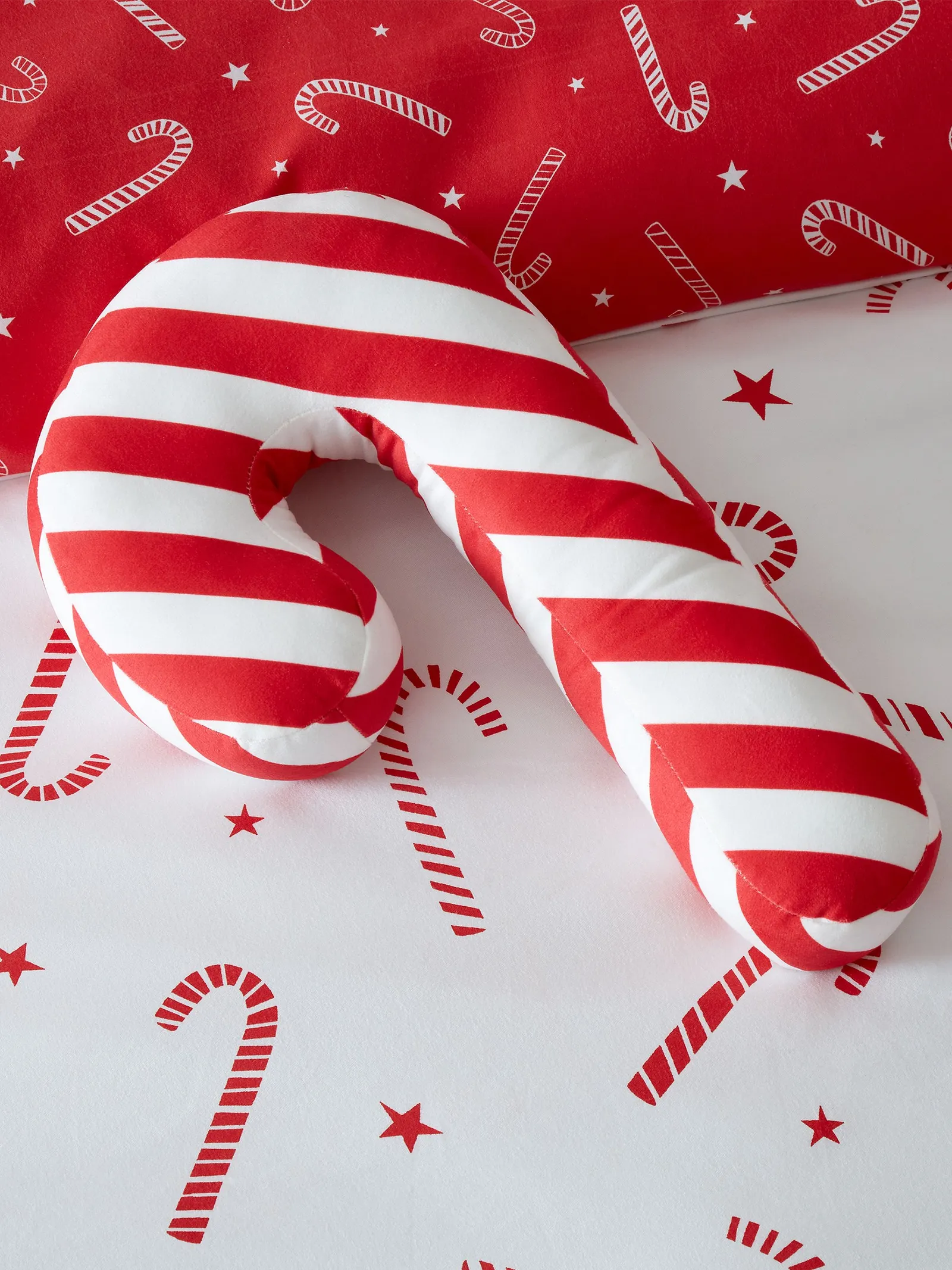 Catherine Lansfield 'Christmas Candy Cane' Cushion in Red