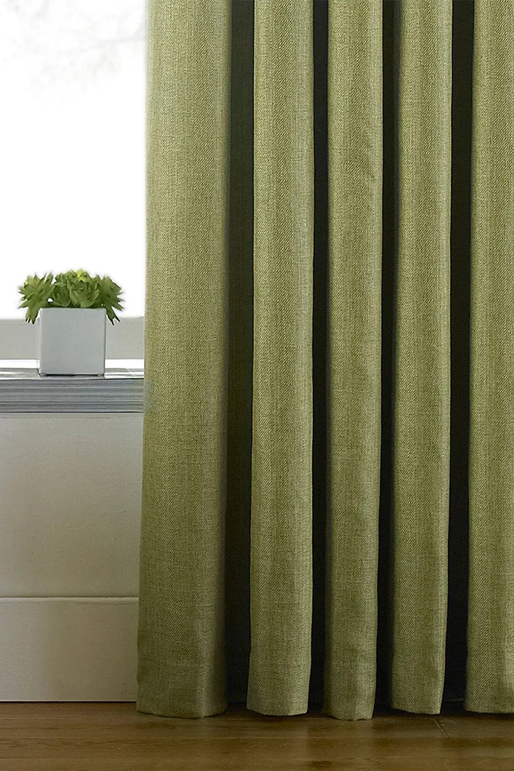 Paoletti Atlantic Twill Woven Eyelet Curtains in Green 3