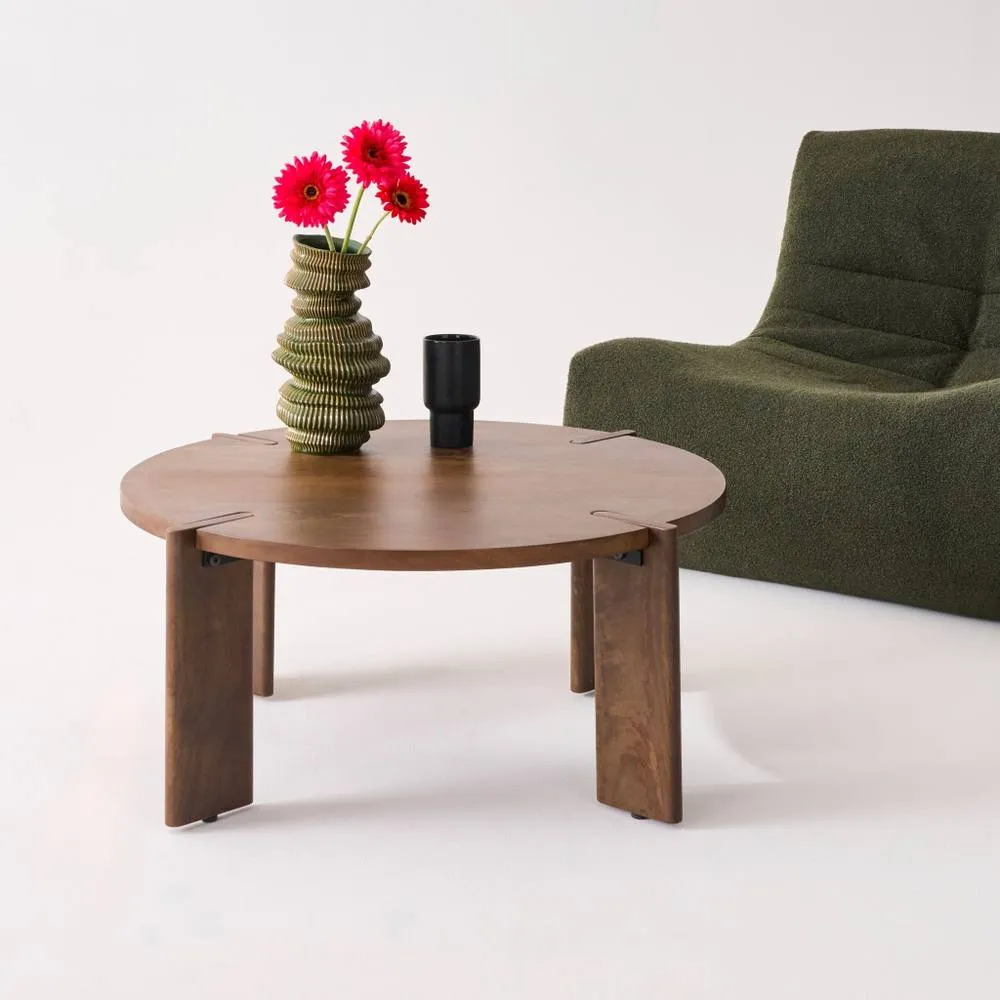 sweeek Exotic Round Solid Wood Coffee Table in Dark Brown 1