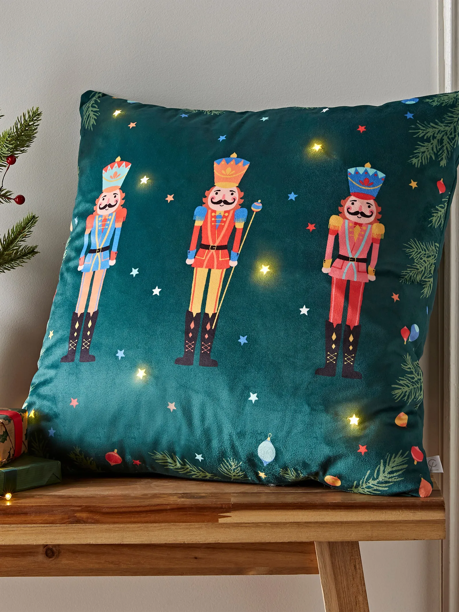 Catherine Lansfield 'Christmas Nutcracker Light Up' Cushion in Green