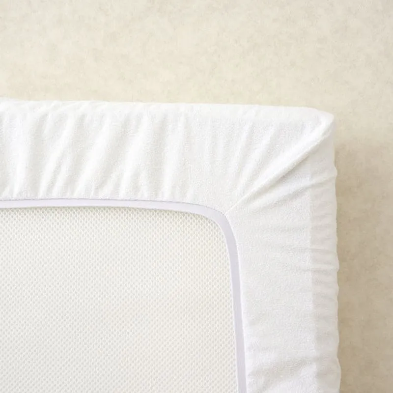 The Tiny Bed Company Waterproof Fitted Mattress Protector for Travel Cot - 95 x 65 cm in White