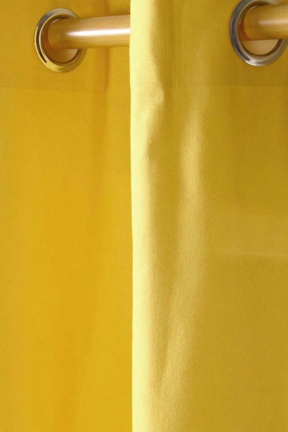 Homescapes Plain Cotton Ready Made Eyelet Curtain Pair in Yellow 2