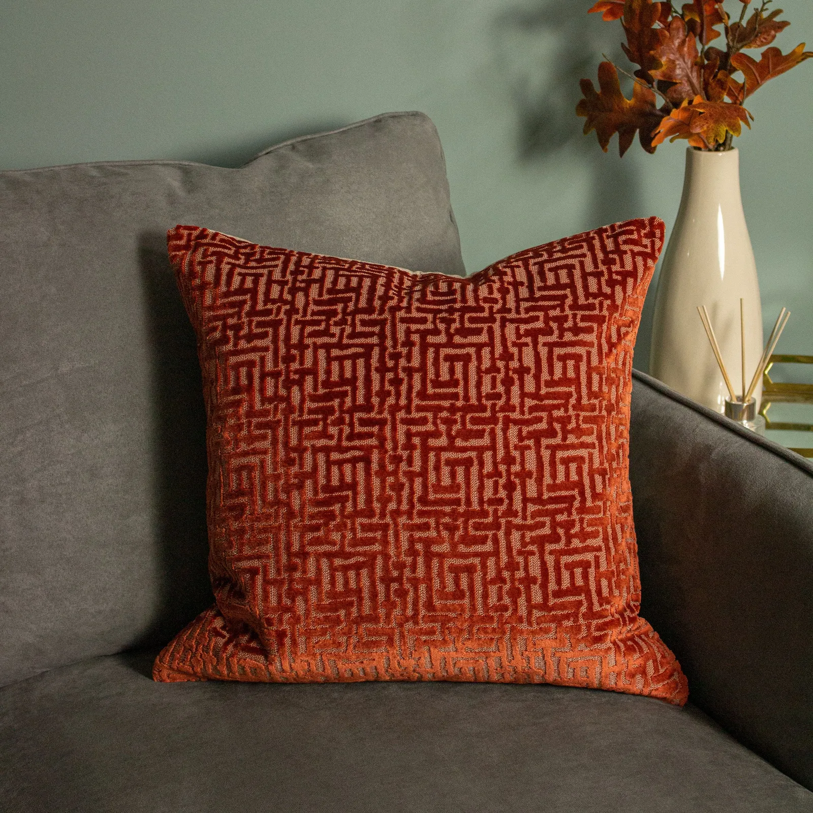 Paoletti Delphi Maze Cut Velvet Cushion in Orange 1