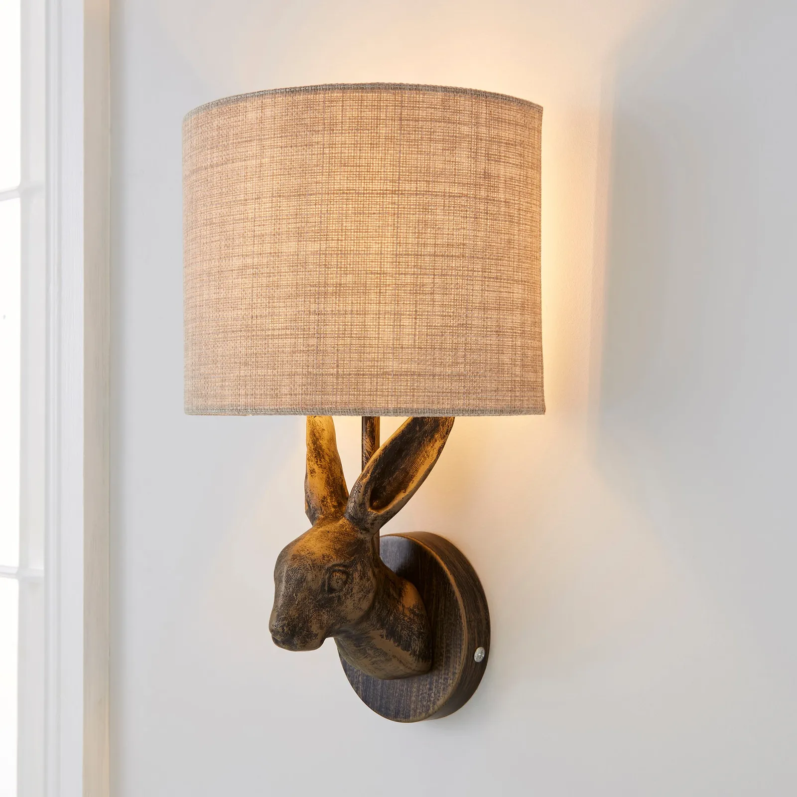 Hare Bronze Wall Light Brass