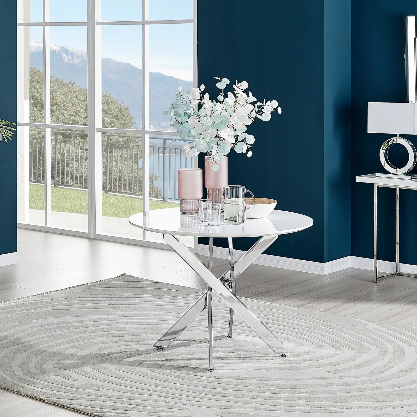 FurnitureboxUK Novara 100cm Round 4-Seater Dining Table With Silver Chrome Legs in White 1