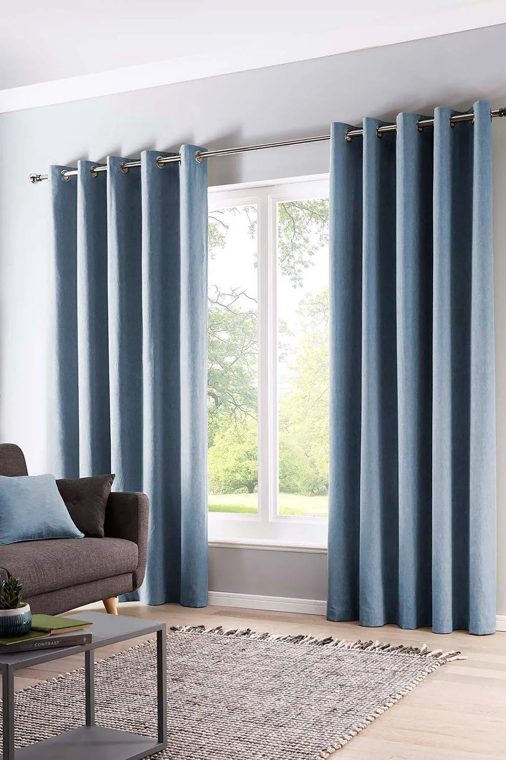 Fusion 'Sorbonne' 100% Cotton Light Filtering Plain Dyed Eyelet Curtains in Light Blue