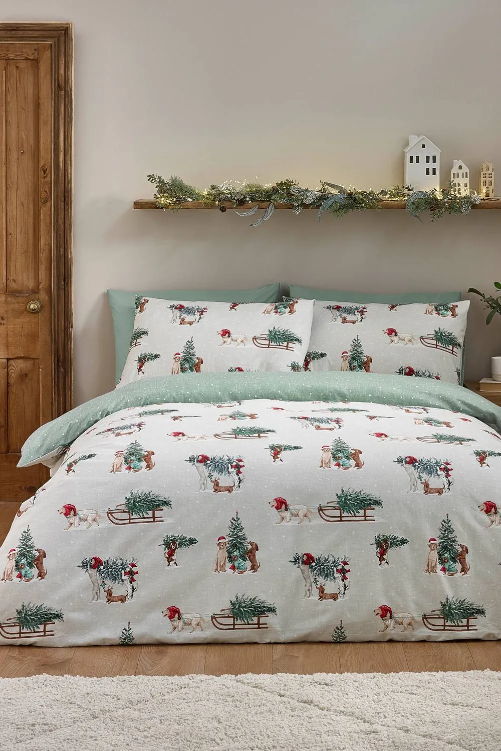 Catherine Lansfield Brushed Christmas Dogs Cotton Reversible Duvet Cover Set in Green