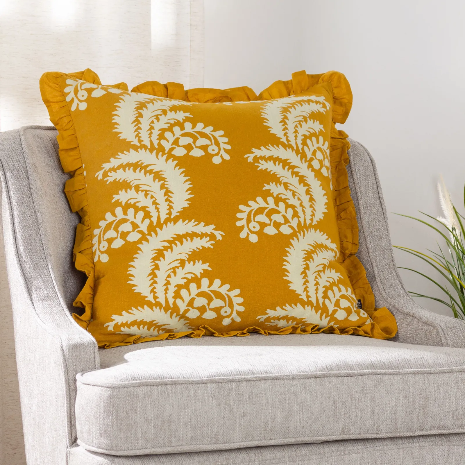 Paoletti Montrose 100% Cotton Fringed Leaf Cushion in Yellow 1