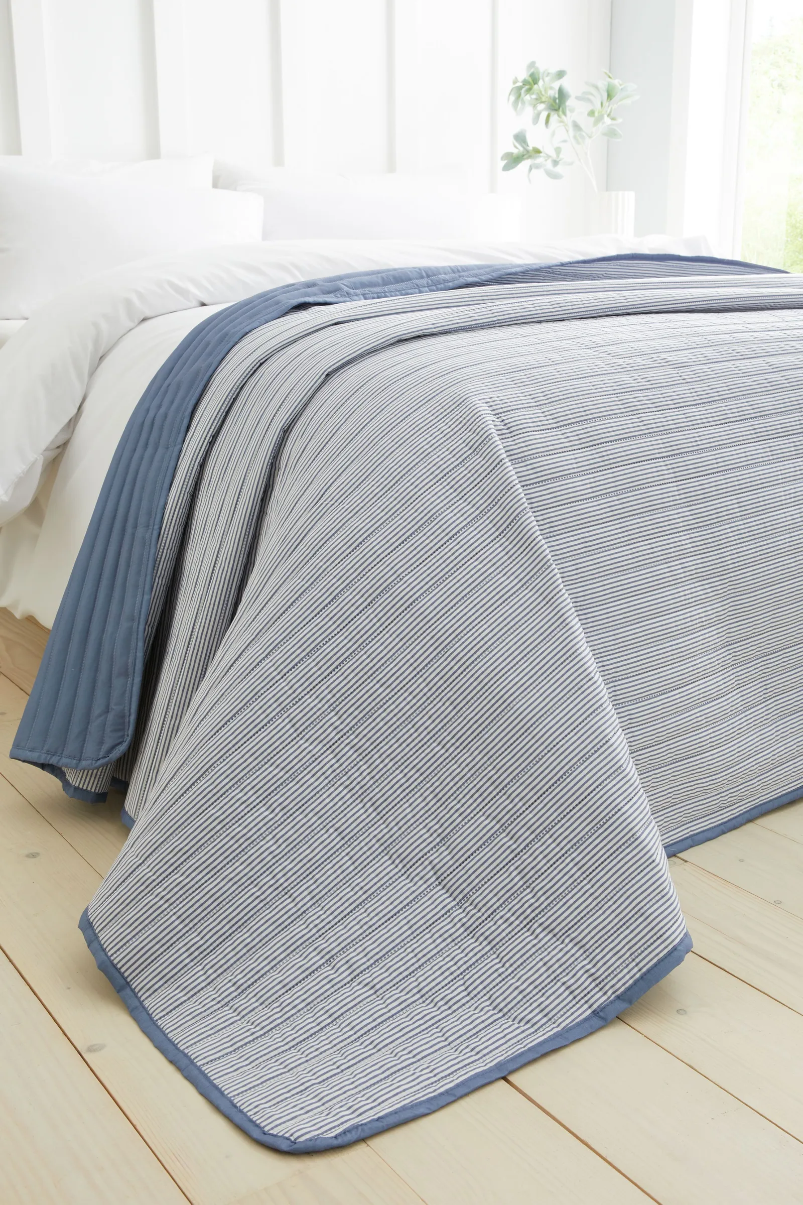 Catherine Lansfield 'Stripe' Quilted Reversible Bedspread in Blue