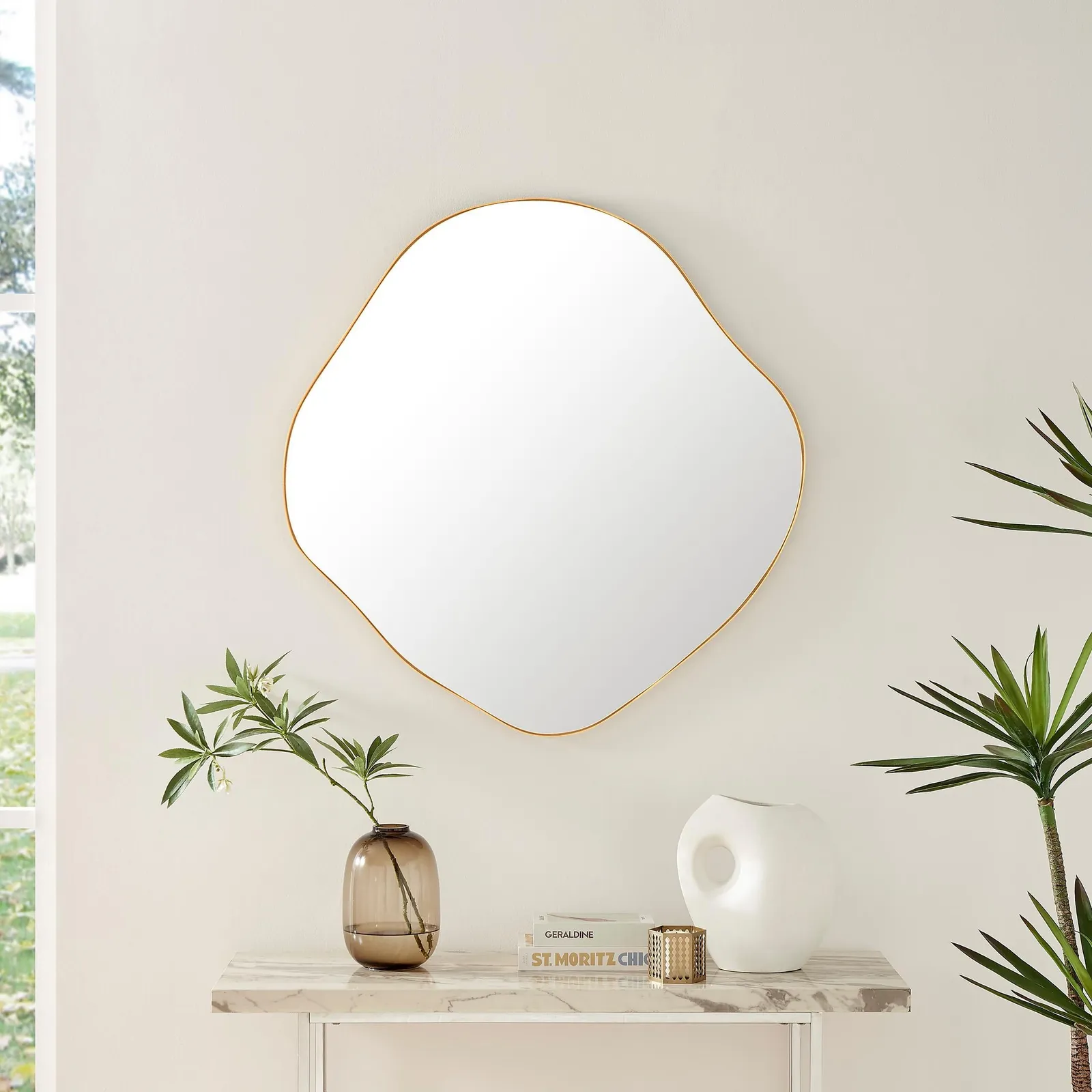 FurnitureboxUK Vita Irregular Pebble Wall Mirror with Black Or Gold Frame