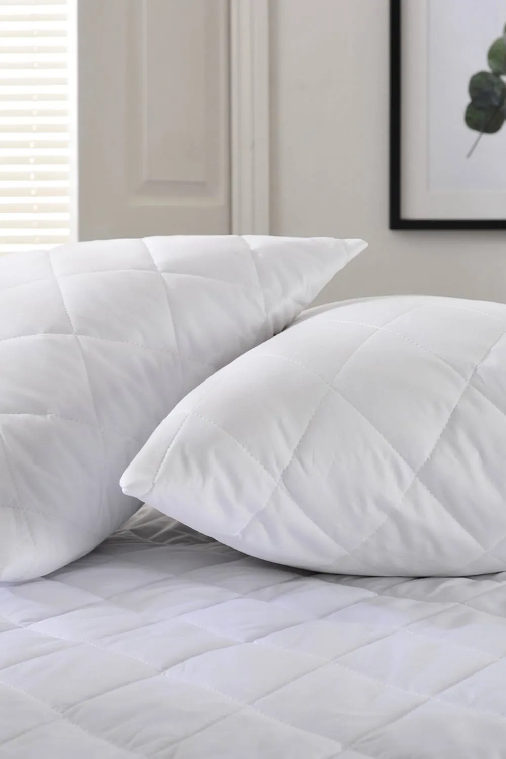 The Lyndon Company Easy Wash Quilted Pillow Protector Pair | Deyongs 1846 in White