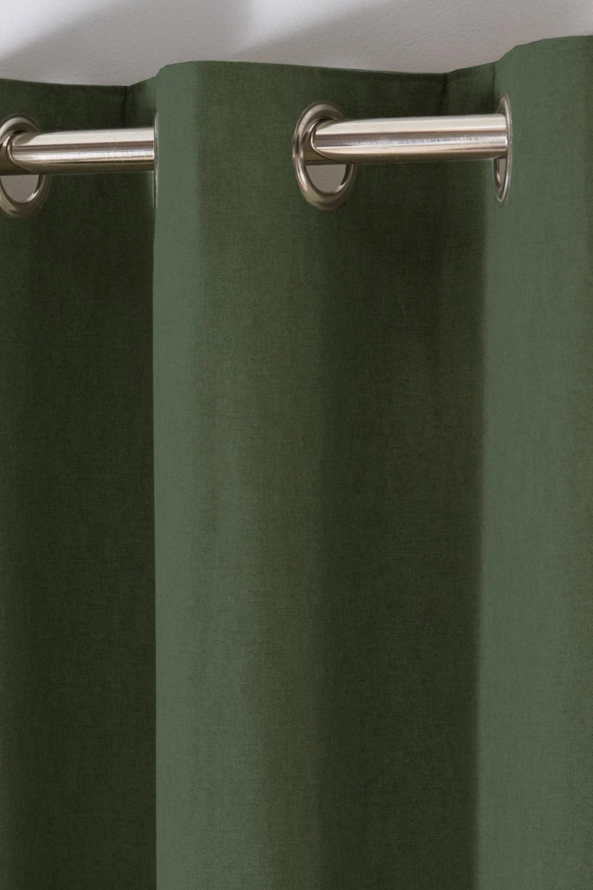 Fusion 'Sorbonne' 100% Cotton Light Filtering Plain Dyed Eyelet Curtains in Bottle Green 2