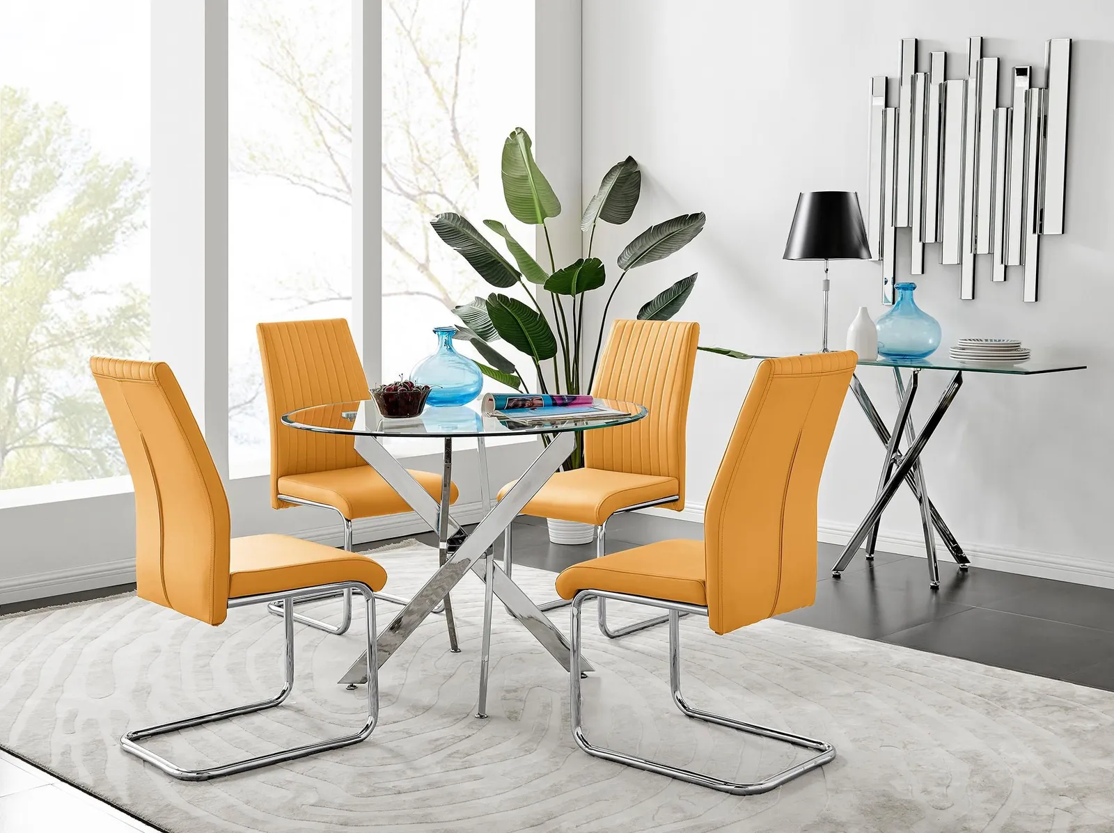 FurnitureboxUK Novara Clear Tempered Glass 100cm Round Dining Table with Chrome Starburst Legs & 4 Lorenzo Faux Leather Chairs in Mustard 1