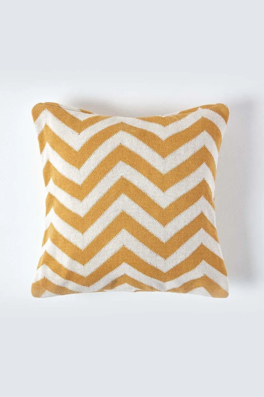 Homescapes Geometric Cotton Knitted Cushion Cover in Mustard