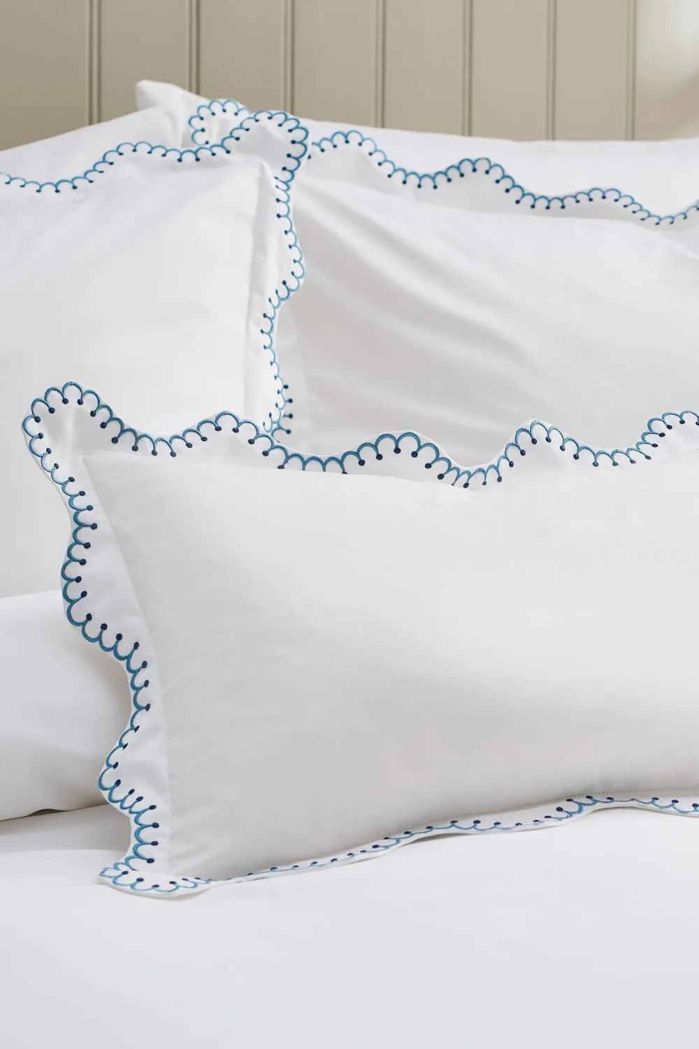 CHRISTY 'Lucerne Scallop' Luxury Cotton Sateen Boudoir Cushion in Indigo 1
